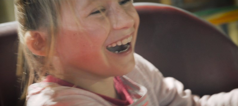 laughing girl on waltzers